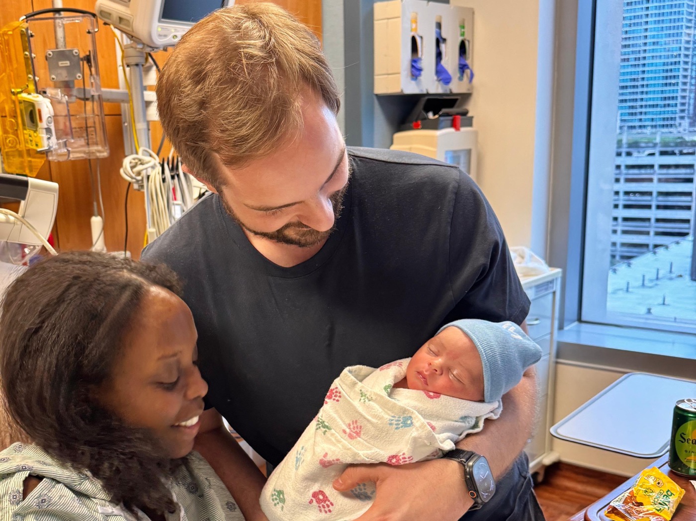 Sébastien, Khadija and their newborn son