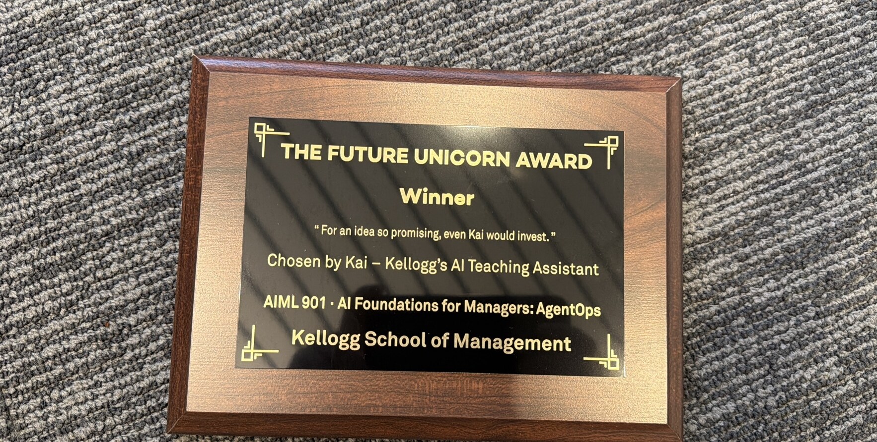 The Future Unicorn Award plaque, chosen by Kai, Kellogg's AI teaching assistant